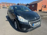 Używany Peugeot 208 Access 82 KM (60 kW) 2013 Czarny Hatchback