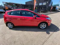 Used Ford Fiesta Zetec 70 HP (51 kW) 2011 Red Hatchback