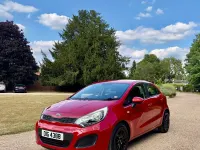 Used Kia Rio 84 HP (61 kW) 2013 Red Hatchback