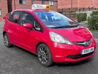 Begagnad Honda Jazz SI 2010 Röd Halvkombi