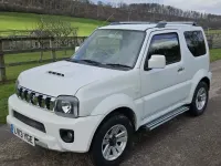 Used Suzuki Jimny SZ4 85 HP (62 kW) 2013 White SUV