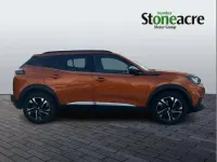 Second-hand Peugeot e-2008 Allure+ 100 kW (136 CP) 2023 Portocaliu SUV