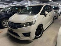 Used Honda Jazz Hybrid 134 HP (98 kW) 2013 White Hatchback