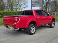 Usado Mitsubishi L200 176 HP (129 kW) 2011 Vermelho Pickup