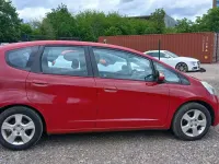 Used Honda Jazz ES 100 HP (73 kW) 2010 Red Hatchback
