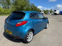 Używany Mazda 2 84 KM (61 kW) 2013 Niebieski Hatchback