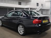 Begagnad BMW 325 2009 Svart Sedan