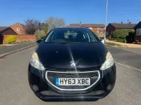 Używany Peugeot 208 Access 82 KM (60 kW) 2013 Czarny Hatchback