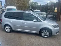Używany VW Touran SE 105 KM (77 kW) 2015 Srebrny Minivan