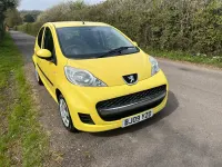 Second-hand Peugeot 107 68 CP (50 kW) 2009 Galben Hatchback
