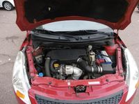 Used Suzuki Swift 75 HP (55 kW) 2011 Monza red mett Hatchback