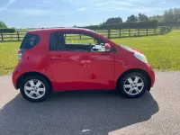 Used Toyota iQ 68 HP (50 kW) 2009 Red Hatchback