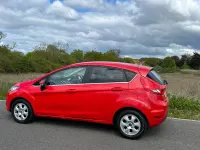 Używany Ford Fiesta Titanium 95 KM (69 kW) 2011 Czerwony Hatchback