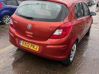 Second-hand Vauxhall Corsa 100 CP (73 kW) 2012 Portocaliu Hatchback