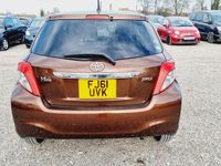 Used Toyota Yaris 69 HP (50 kW) 2012 Brown Hatchback
