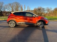 Used Renault Captur Dynamique 90 HP (66 kW) 2014 Orange/cream SUV