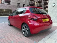 Używany Peugeot 208 Access 68 KM (50 kW) 2015 Czerwony Hatchback