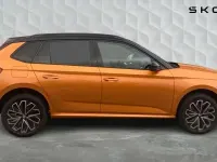 Used Skoda Kamiq Design Edition 116 HP (85 kW) 2026 Phoenix orange metallic black magic pearl effect SUV