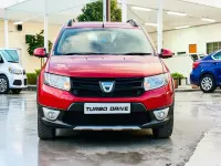 Używany Dacia Sandero Ambiance 90 KM (66 kW) 2014 Czerwony Hatchback