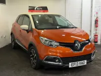 Used Renault Captur Dynamique 90 HP (66 kW) 2013 Orange/cream SUV