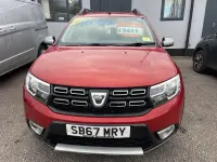 Używany Dacia Sandero Ambiance 90 KM (66 kW) 2017 Czerwony Hatchback