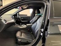 Used BMW 330e M Sport 288 HP (211 kW) 2022 Black Estate