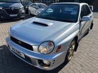 Begagnad Subaru Impreza 2002 Silver Sedan