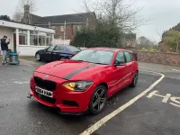 Używany BMW 120 2011 Czerwony Hatchback