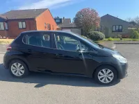 Używany Peugeot 208 Access 82 KM (60 kW) 2013 Czarny Hatchback
