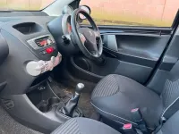 Używany Peugeot 107 Allure 68 KM (50 kW) 2013 Czarny Hatchback