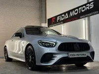 Used Mercedes E220 AMG line 191 HP (140 kW) 2022 Silver Coupe