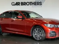 Begagnad BMW 330e M Sport 2021 Orange Sedan