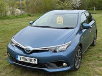 Used Toyota Auris Hybrid Design 136 HP (100 kW) 2016 Blue Hatchback