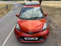 Used Toyota Aygo 68 HP (50 kW) 2013 Orange Hatchback