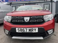 Używany Dacia Sandero Ambiance 90 KM (66 kW) 2017 Czerwony Hatchback