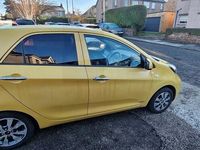 Used Kia Picanto 68 HP (50 kW) 2016 Yellow Hatchback